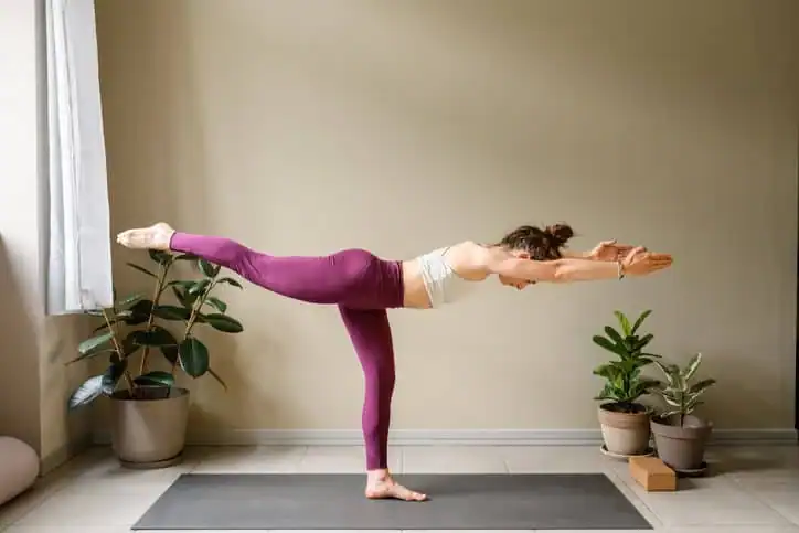 Achieving the Perfect Tone: How Often Should You Exercise for Results? 1 Woman doing Yoga exercise York to help with toning the body.