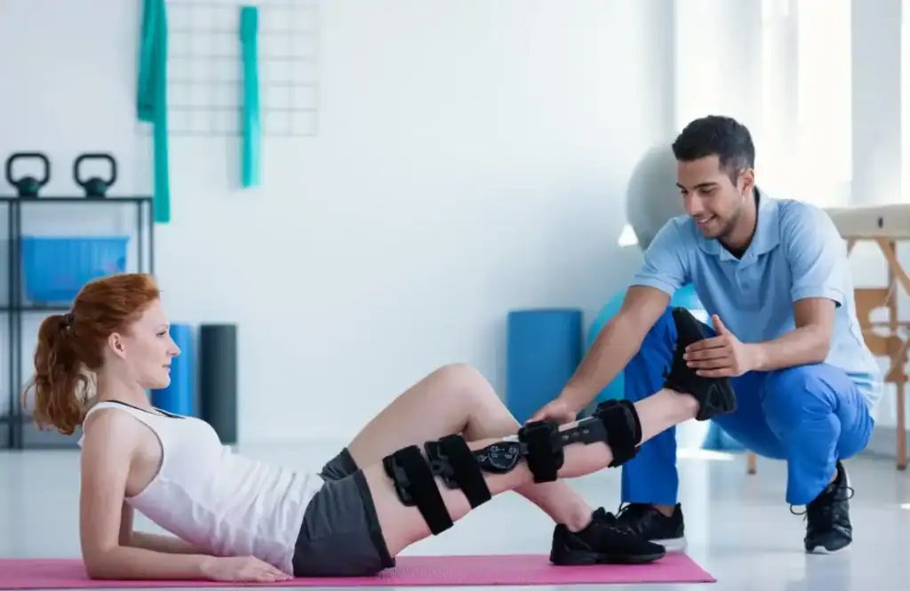 Woman having treatment to help muscle recovery York after an injury
